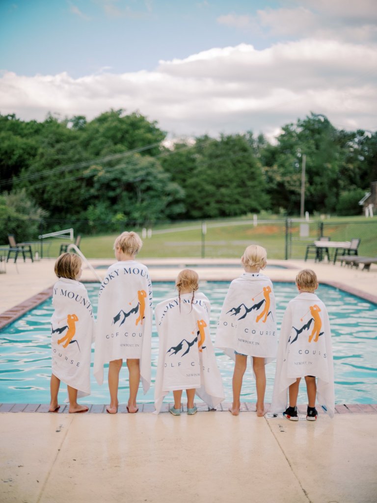 Group of swimmers by the pool